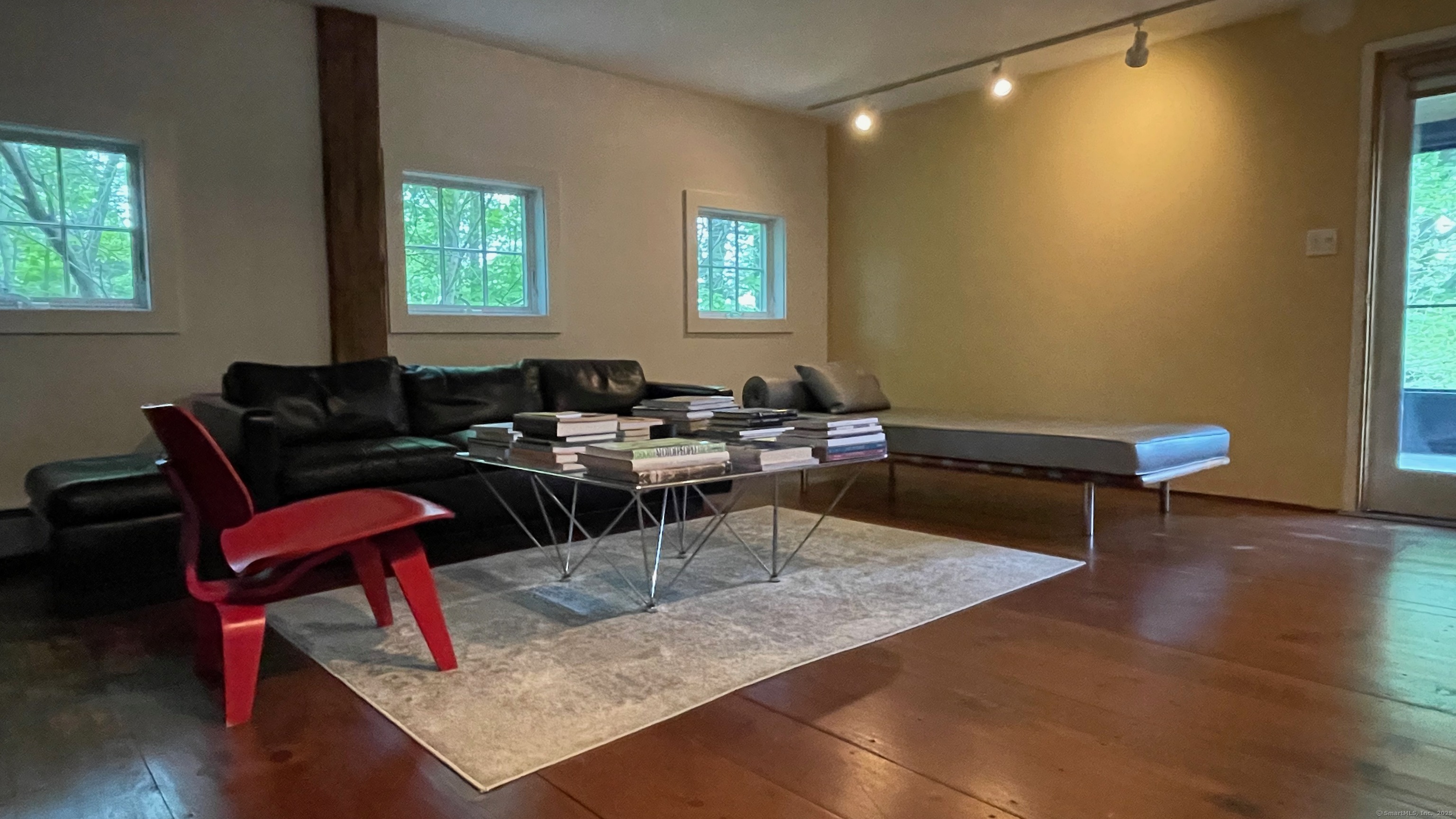 58 Wells Hill Road Weston, CT 06883 - Photo 13 of 38 a living room with furniture and wooden floor