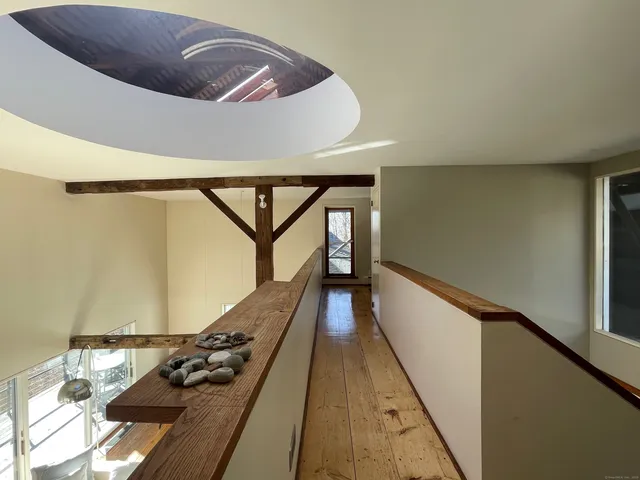 a room with window and a wooden floor