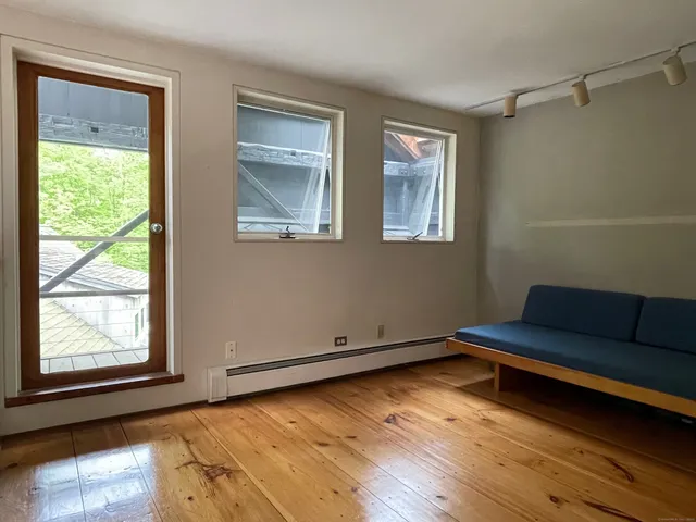 a picture of a bench in a white building