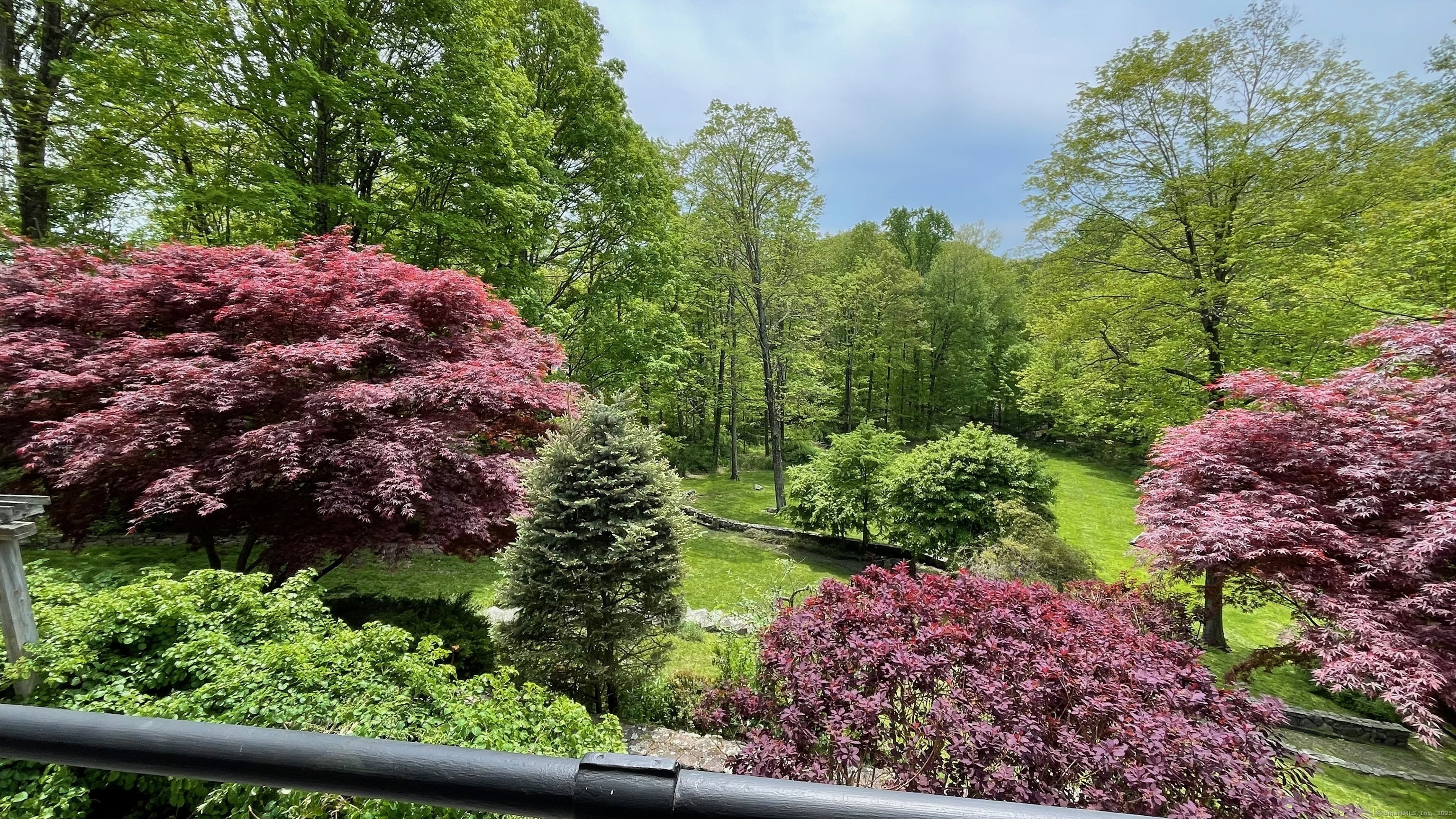 58 Wells Hill Road Weston, CT 06883 - Photo 33 of 38 a view of a garden with plants