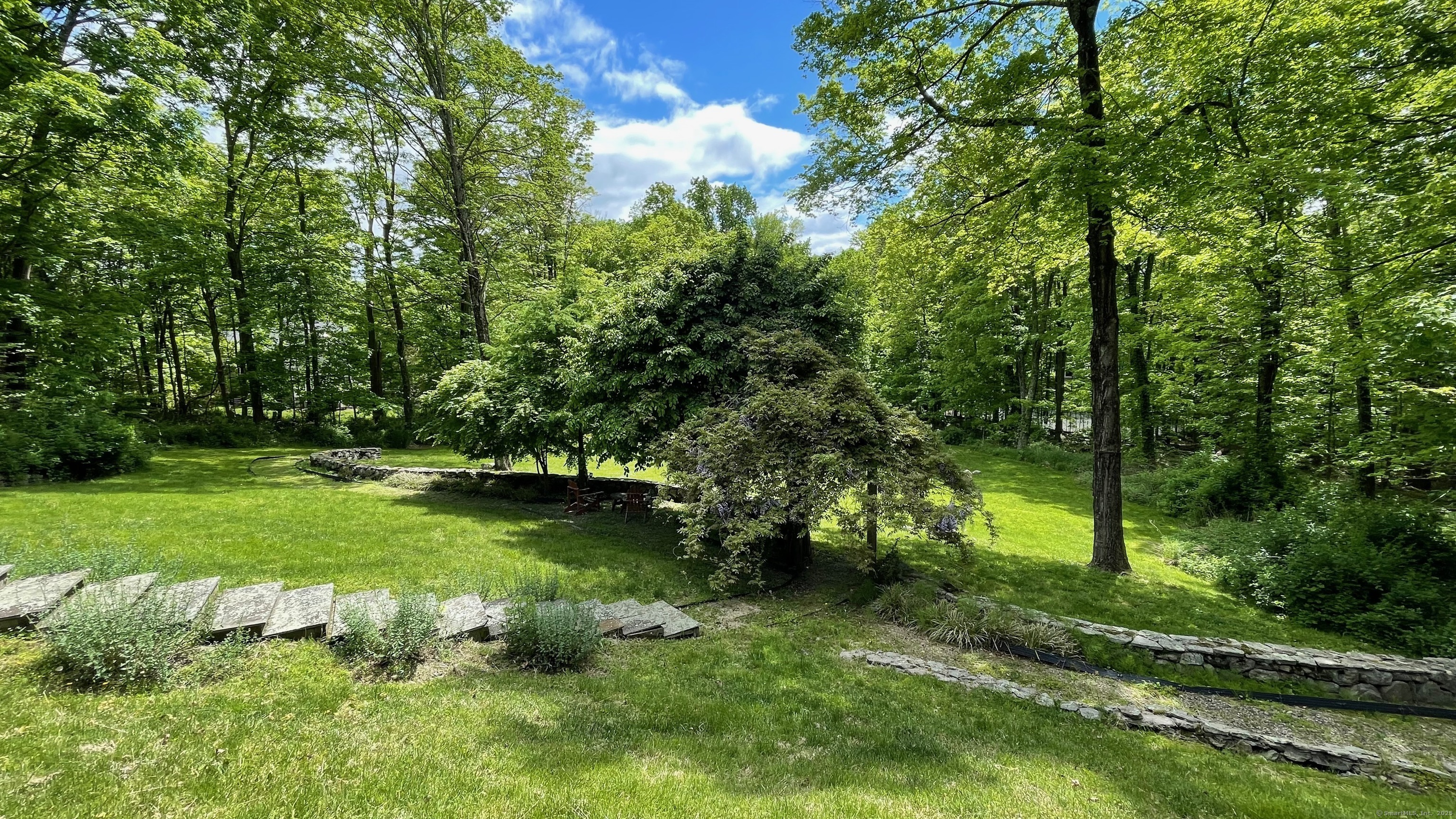 58 Wells Hill Road Weston, CT 06883 - Photo 35 of 38 a view of a park with large trees