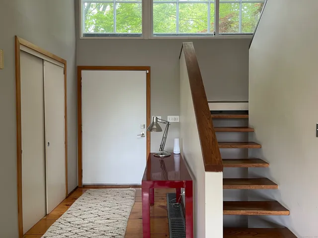a view of entryway with a front door