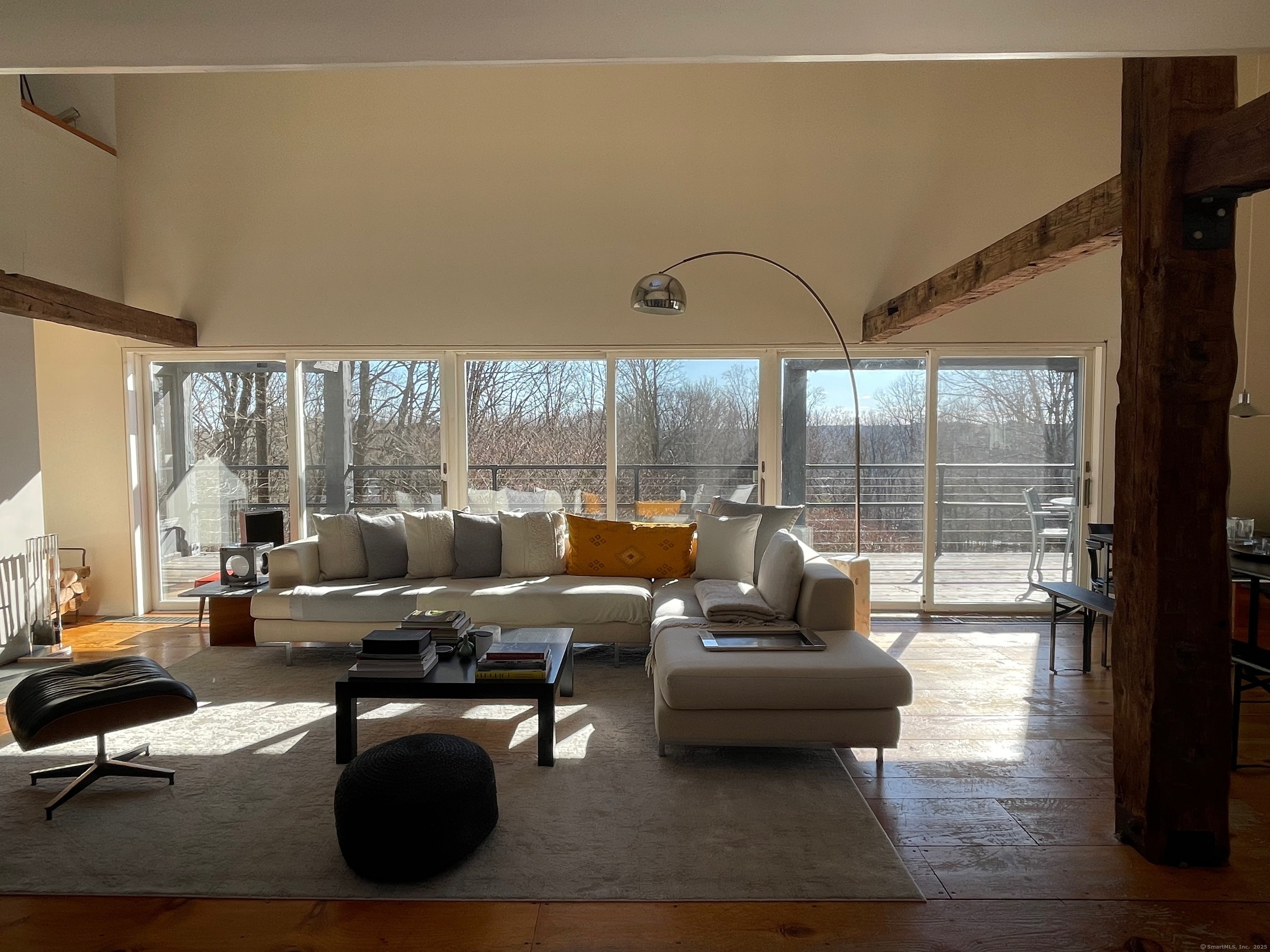 58 Wells Hill Road Weston, CT 06883 - Photo 6 of 38 a living room with furniture and a large window