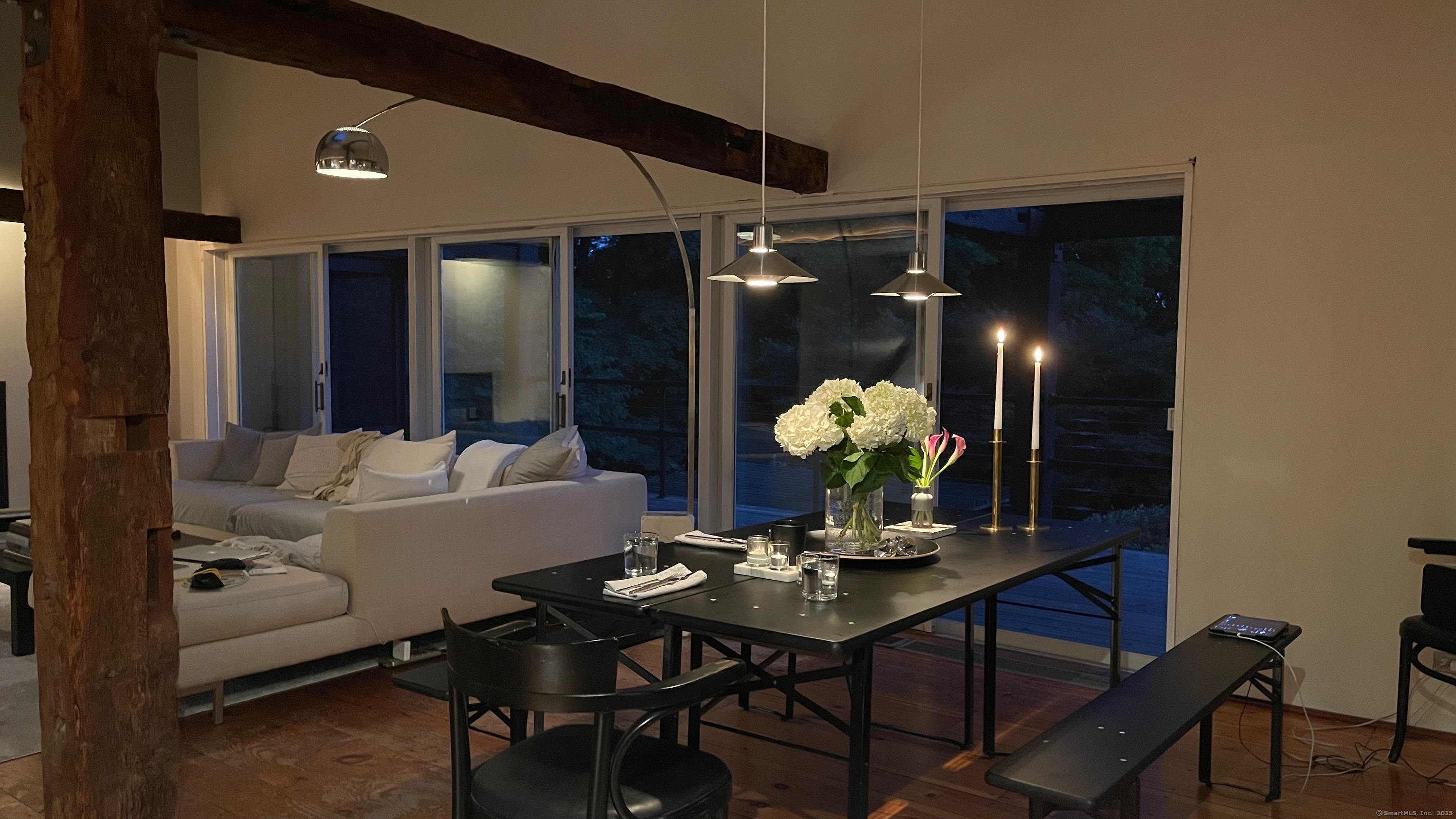 58 Wells Hill Road Weston, CT 06883 - Photo 8 of 38 a living room with furniture and potted plants