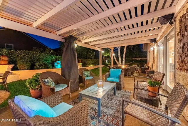 a building view with outdoor seating space