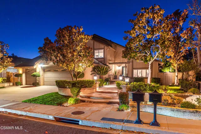 an aerial view of residential house and green space