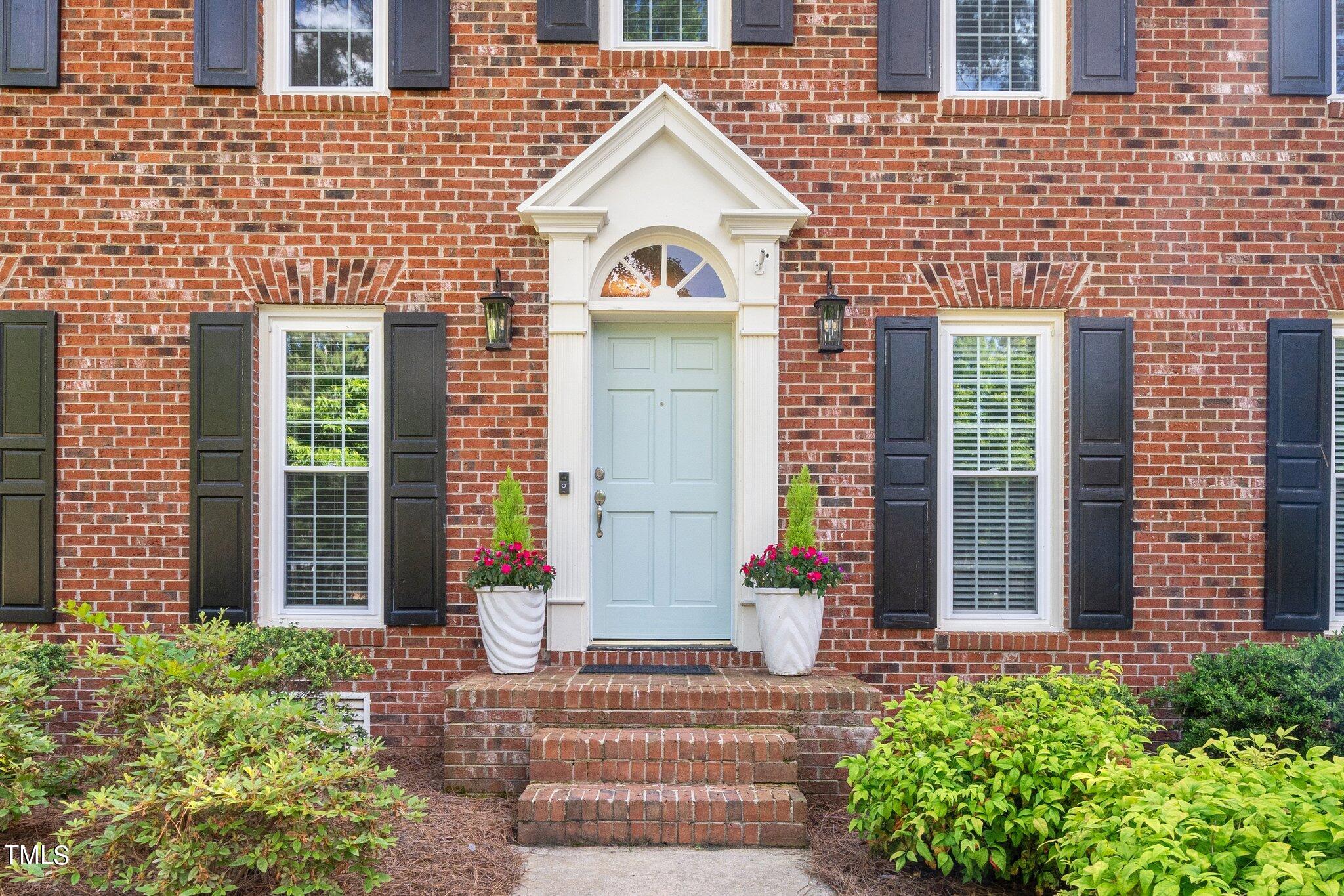 713 Misty Isle Place Raleigh, NC 27615 - Photo 3 of 39 4-web-or-mls-713 Misty Isle Pl Front Doo