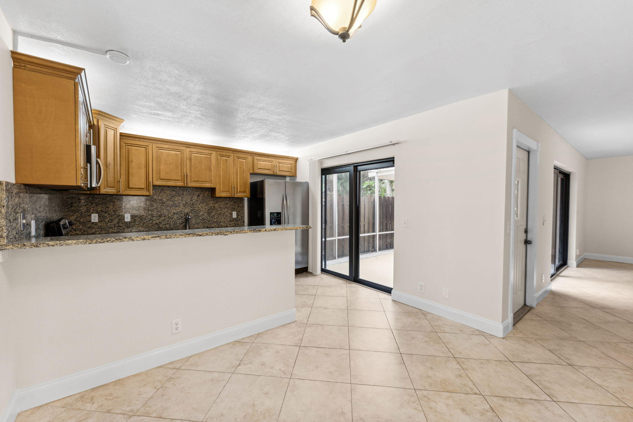 2438 Waterside Drive Lake Worth, FL 33461 - Photo 11 of 26 a view of a kitchen with a sink and cabinets