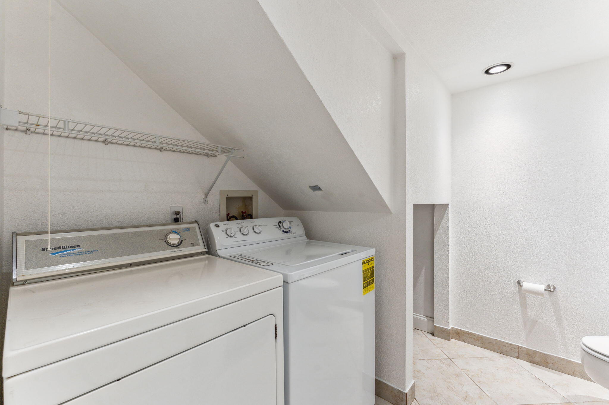 2438 Waterside Drive Lake Worth, FL 33461 - Photo 15 of 26 a utility room with dryer and washer