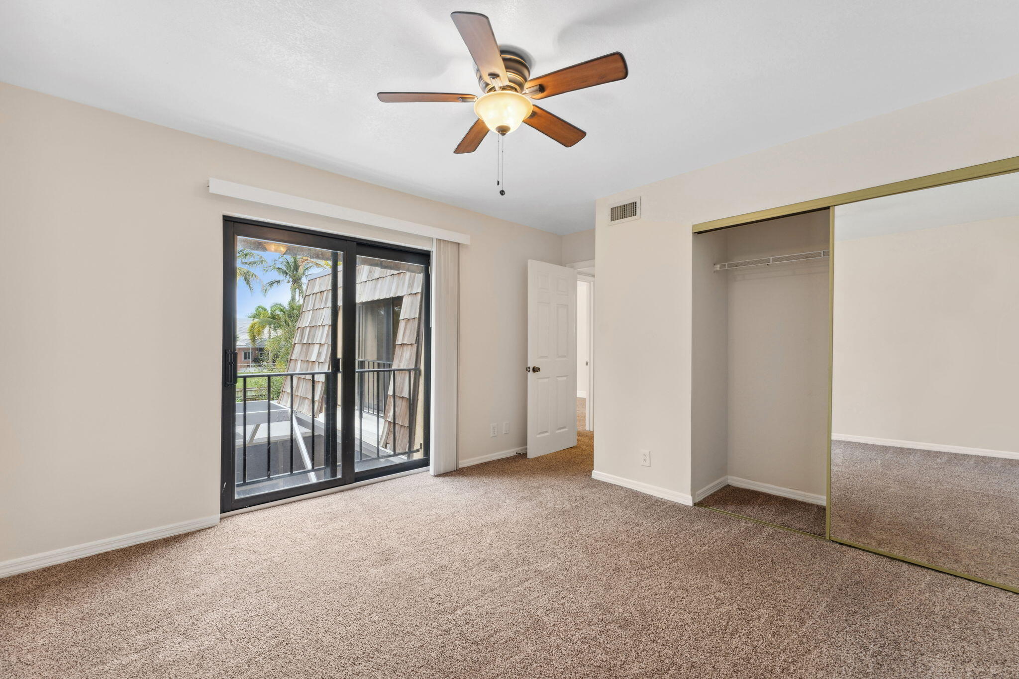 2438 Waterside Drive Lake Worth, FL 33461 - Photo 20 of 26 a view of an empty room with a window