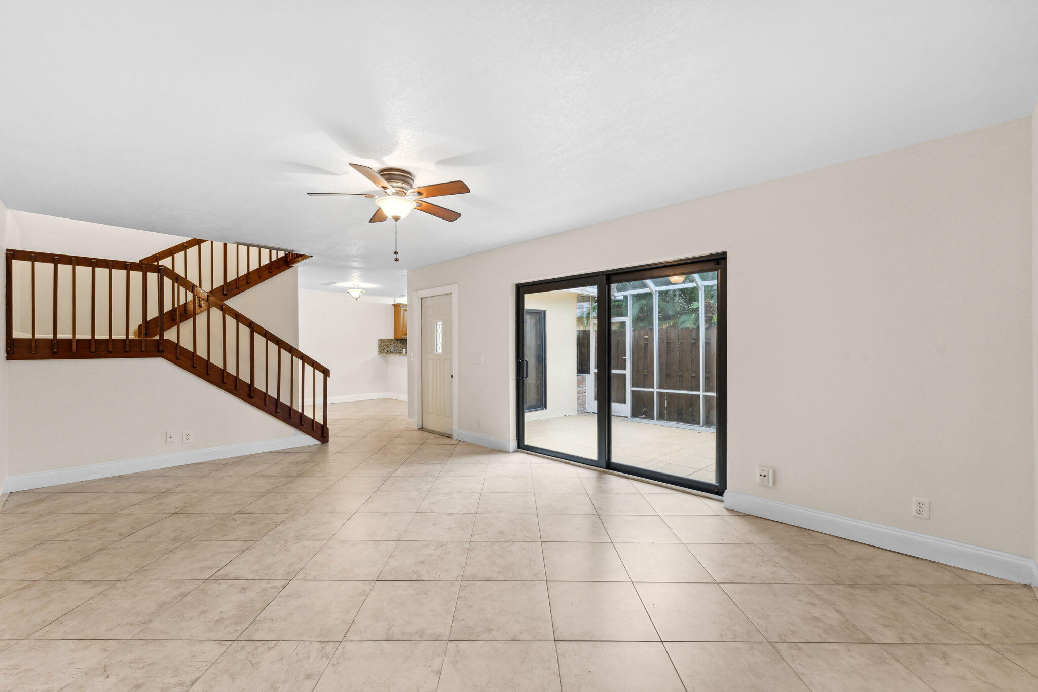 2438 Waterside Drive Lake Worth, FL 33461 - Photo 7 of 26 a view of an entryway with a chandelier