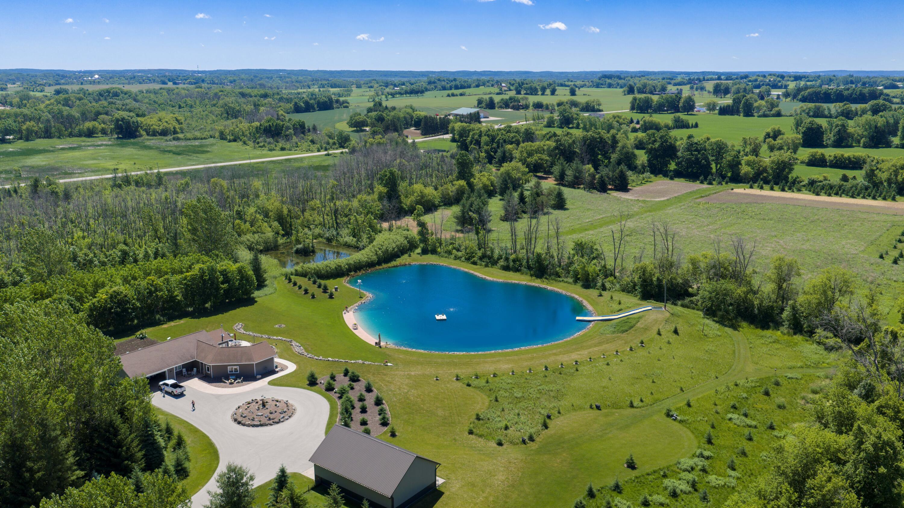 W985 Fur Farm Road New Holstein, WI 53061 - Photo 5 of 57 DJI_20260612110545_0525_D
