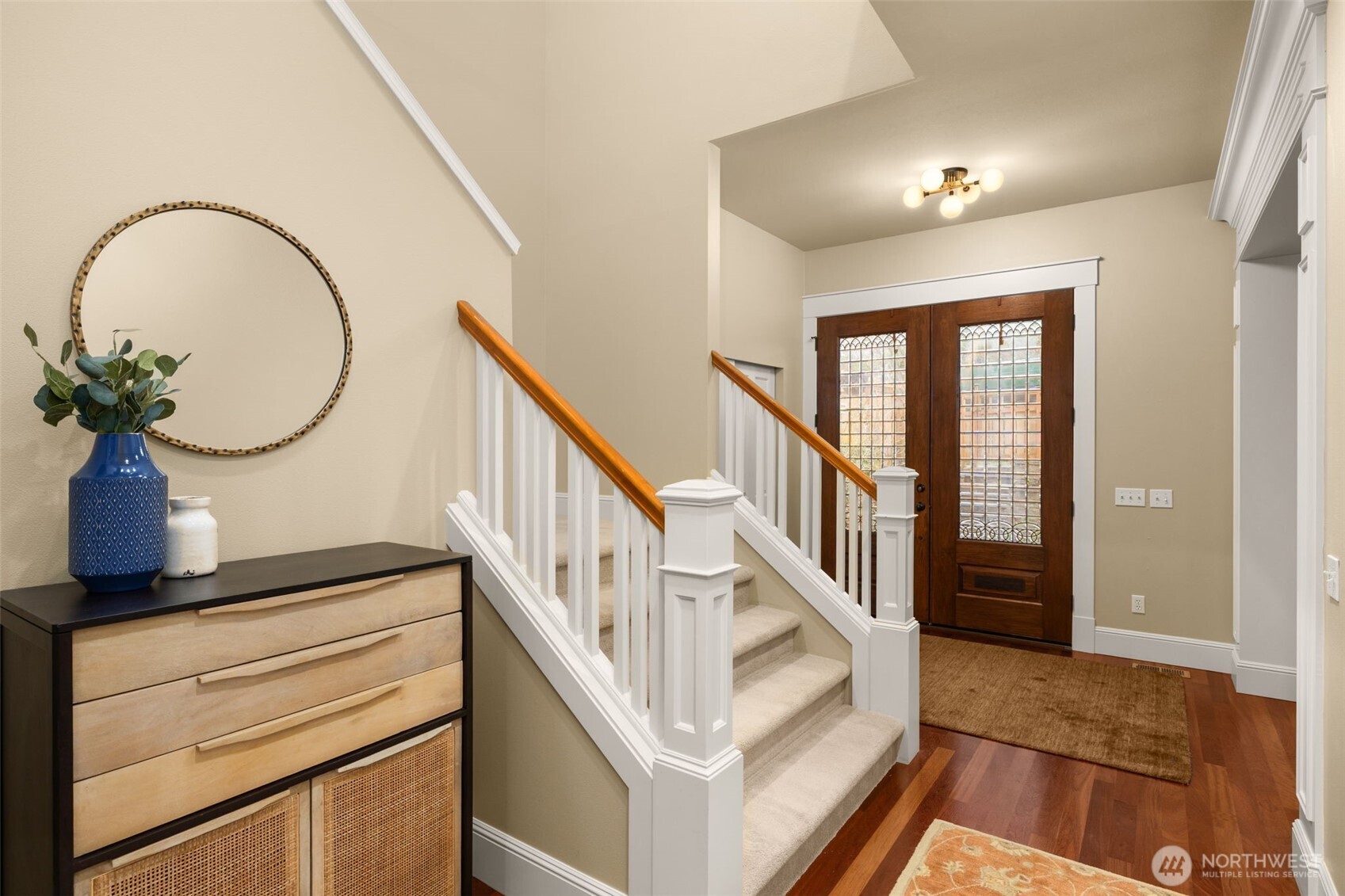 8360 Loyal Way Northwest Seattle, WA 98117 - Photo 15 of 36 a view of entryway and hall with wooden floor