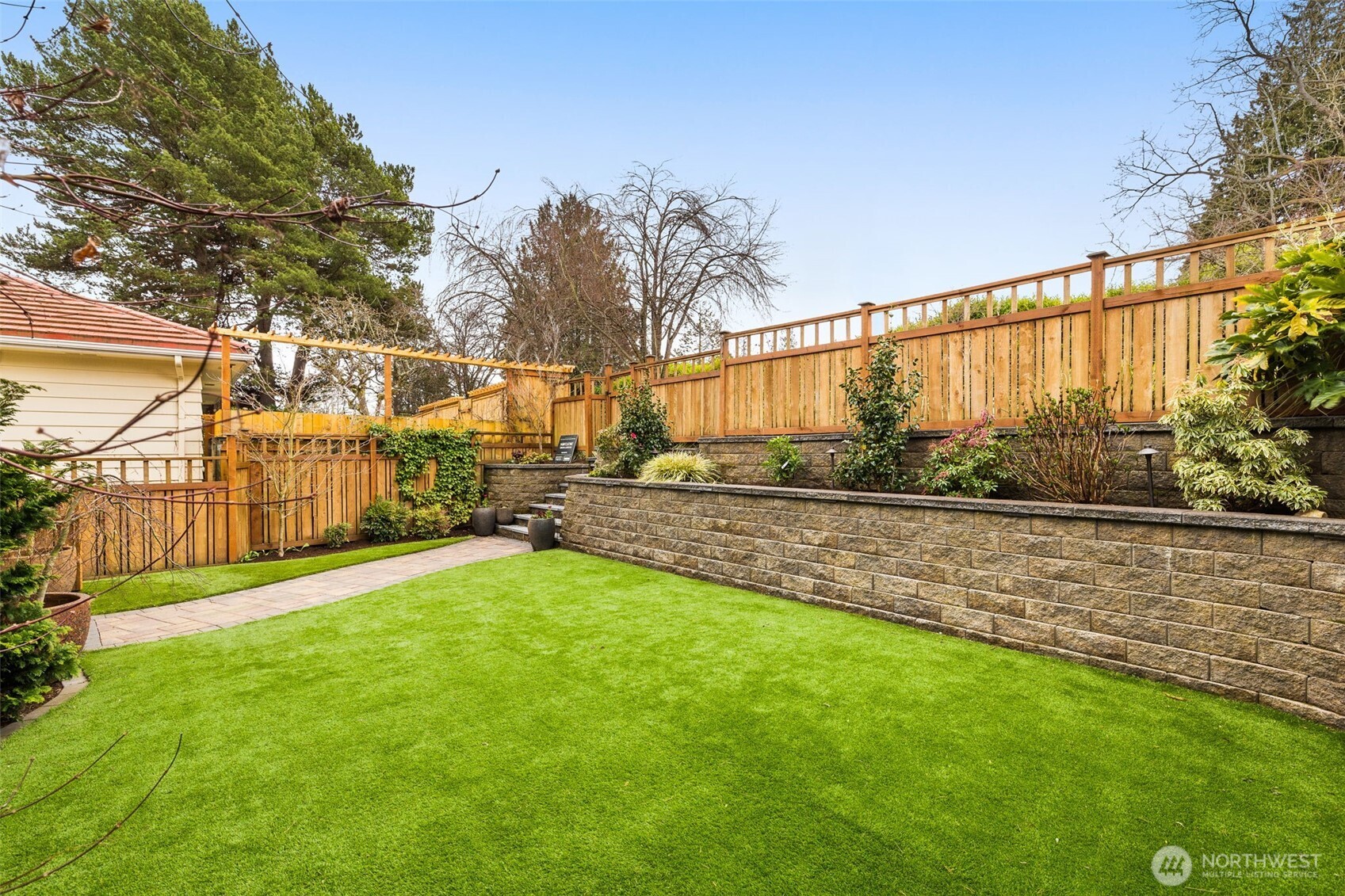 8360 Loyal Way Northwest Seattle, WA 98117 - Photo 30 of 36 a view of yard with swimming pool and green space