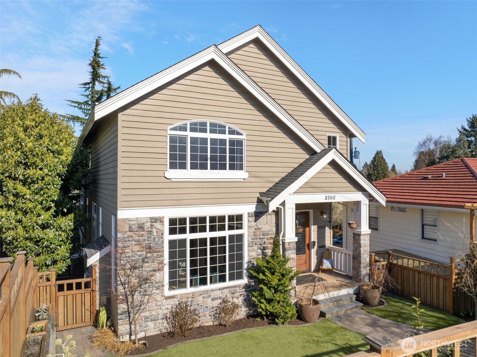 8360 Loyal Way Northwest Seattle, WA 98117 - Photo 36 of 36 a front view of a house with a yard
