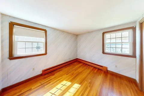 a view of a room with windows