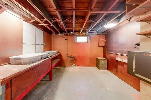 a bed room with a bed and furniture