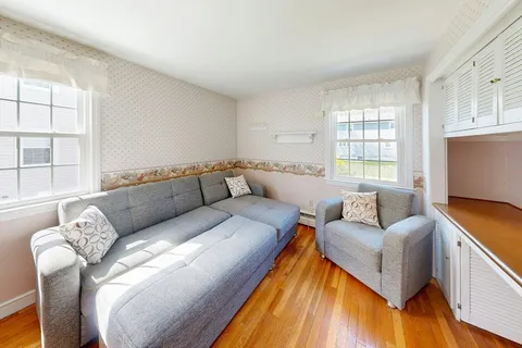 a living room with furniture and a couch