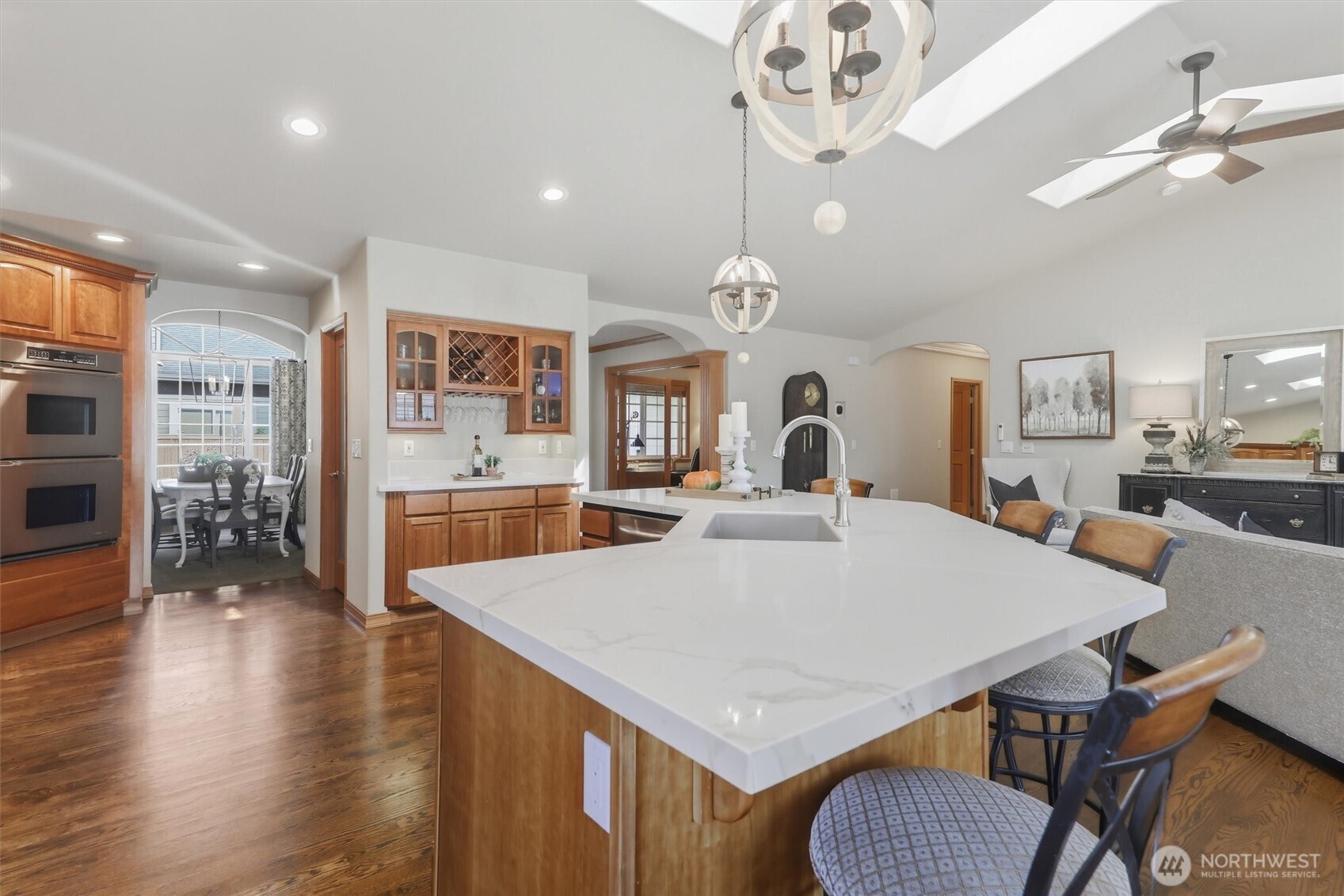 20615 39th Avenue Southeast Bothell, WA 98021 - Photo 9 of 36 a large kitchen with a table and chairs
