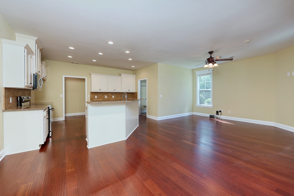 182 Oak Ridge Drive Waverly Hall, GA 31831 - Photo 29 of 52 a view of a kitchen with a sink and a refrigerator