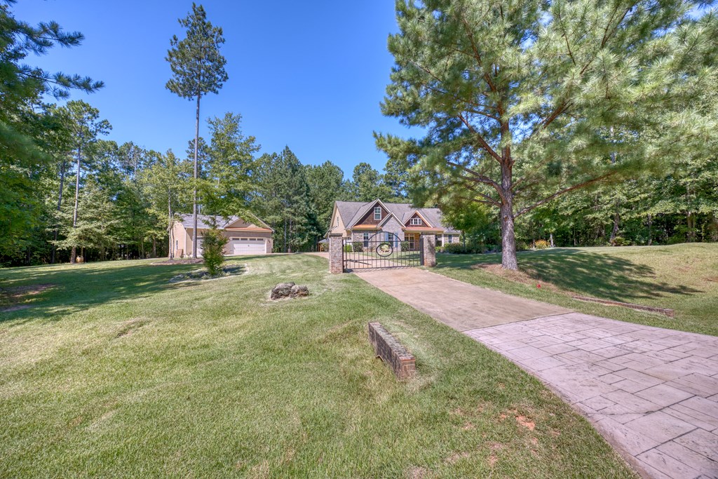 182 Oak Ridge Drive Waverly Hall, GA 31831 - Photo 4 of 52 a view of a house with a yard