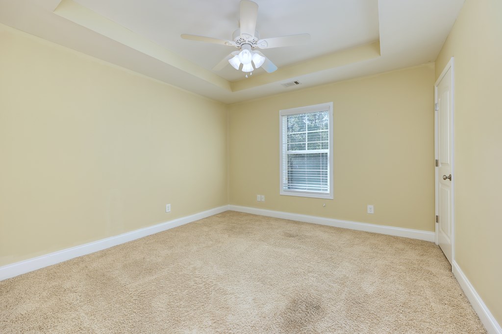 182 Oak Ridge Drive Waverly Hall, GA 31831 - Photo 41 of 52 a view of an empty room with a window