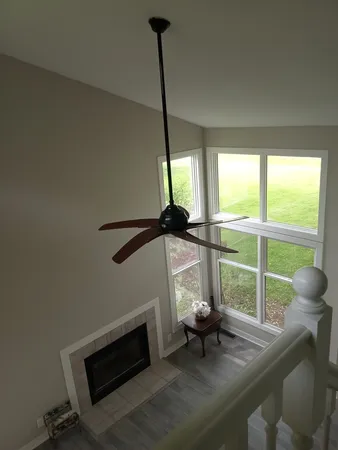 a sitting area with furniture and a window