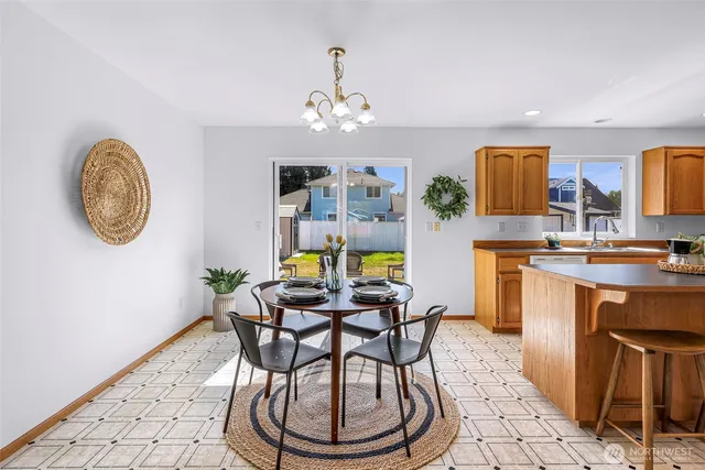 a view of a dining room with furniture