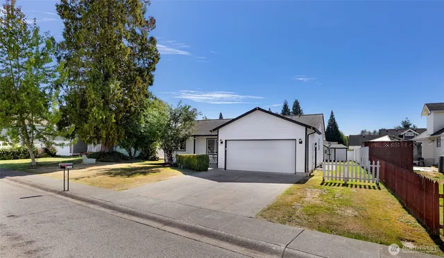 a view of swimming pool in front of residential houses