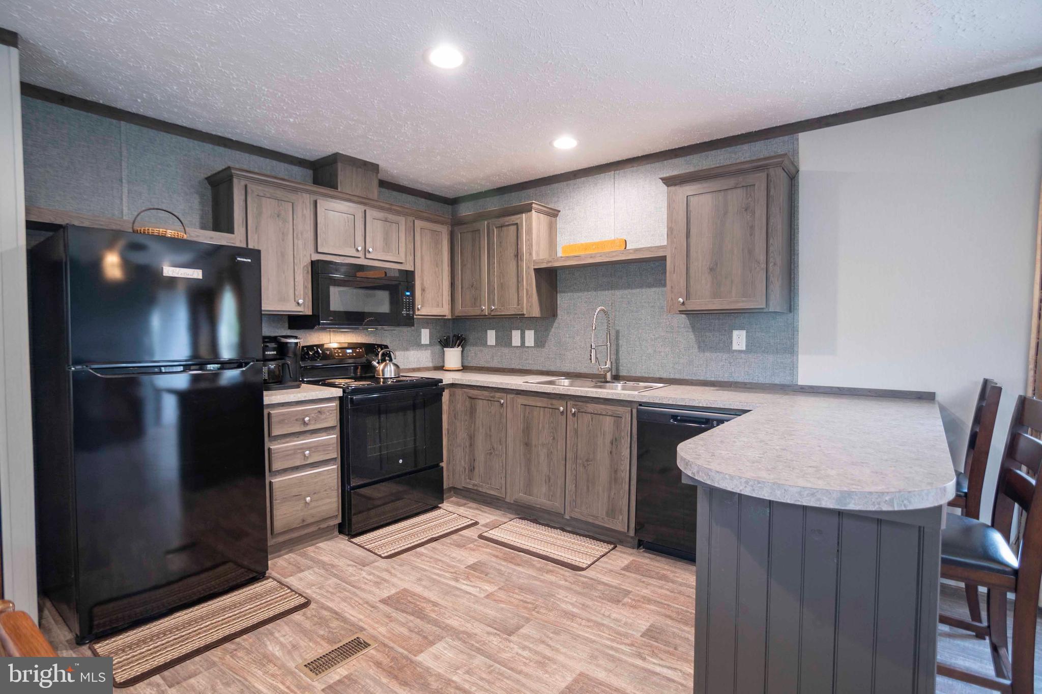 246 Zepp Road Maurertown, VA 22644 - Photo 10 of 36 Kitchen w/ Breakfast Bar