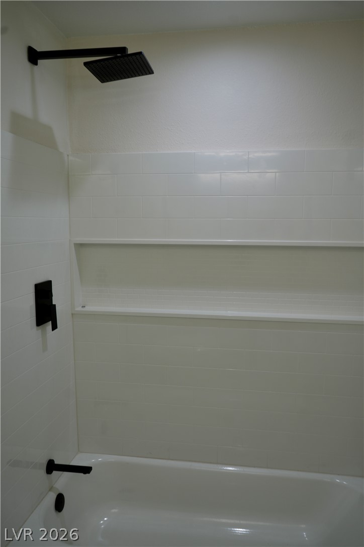 2351 Valleywood Road Henderson, NV 89014 - Photo 23 of 43 Full bath featuring bathing tub / shower combination