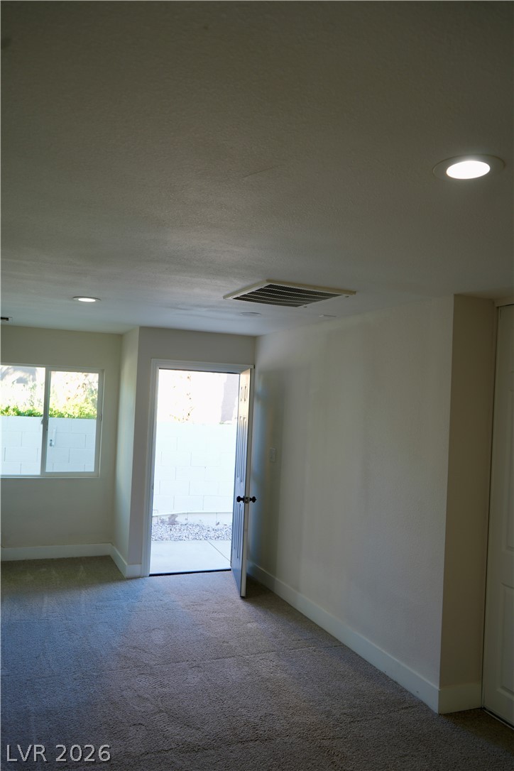 2351 Valleywood Road Henderson, NV 89014 - Photo 25 of 43 Spare room featuring recessed lighting and carpet