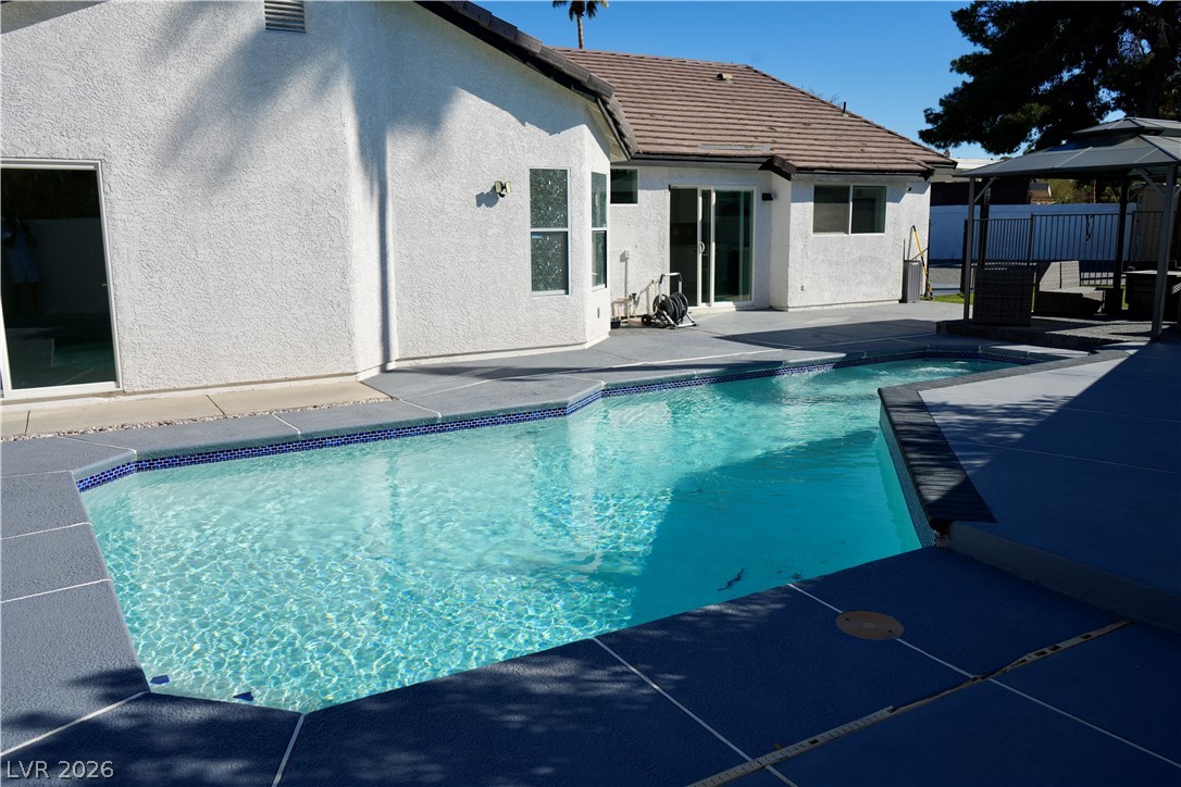 2351 Valleywood Road Henderson, NV 89014 - Photo 31 of 43 View of pool featuring patio surround and a gazebo
