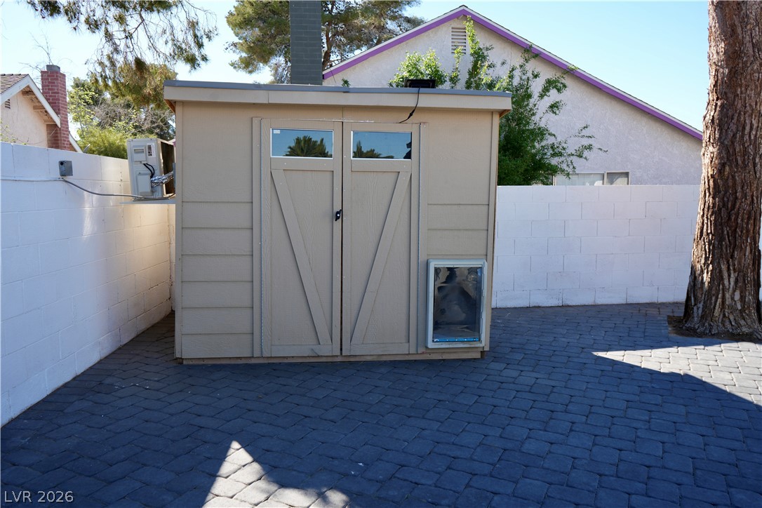 2351 Valleywood Road Henderson, NV 89014 - Photo 37 of 43 View of shed featuring a fenced backyard