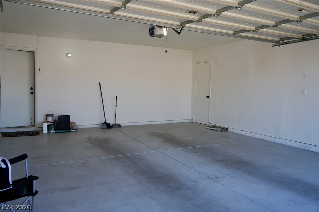 2351 Valleywood Road Henderson, NV 89014 - Photo 40 of 43 Garage featuring a garage door opener