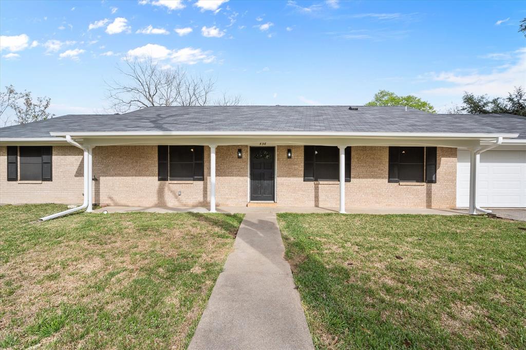 536 Robindale Lane Fairfield, TX 75840 - Photo 37 of 38 a front view of a house with a garden