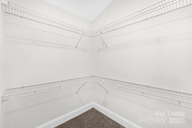 a view of a room with racks on the wall