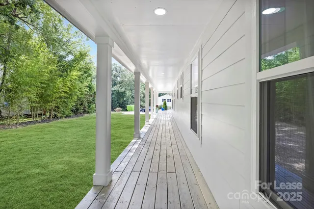 a view of a patio with wooden floor and outdoor space