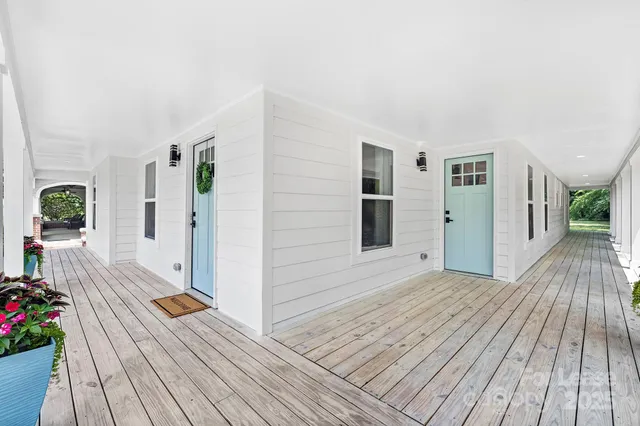 a view of a backyard of the house