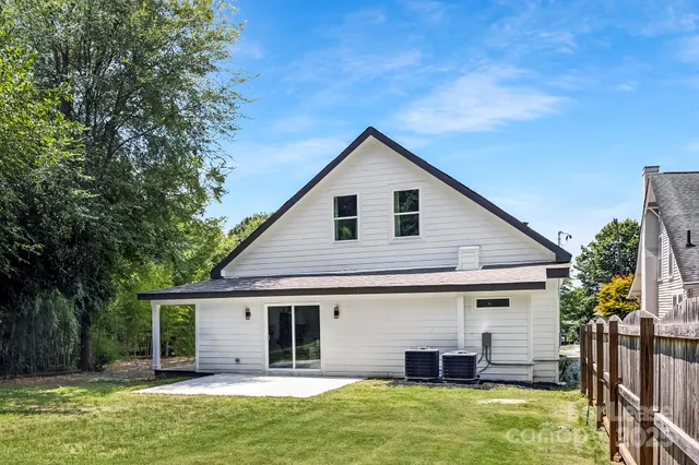 a view of a house with a swimming pool