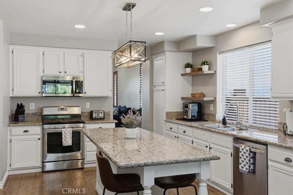 8509 Cabin Place Riverside, CA 92508 - Photo 17 of 67 Open kitchen with spacious counters, custom lighting and lots of storage.