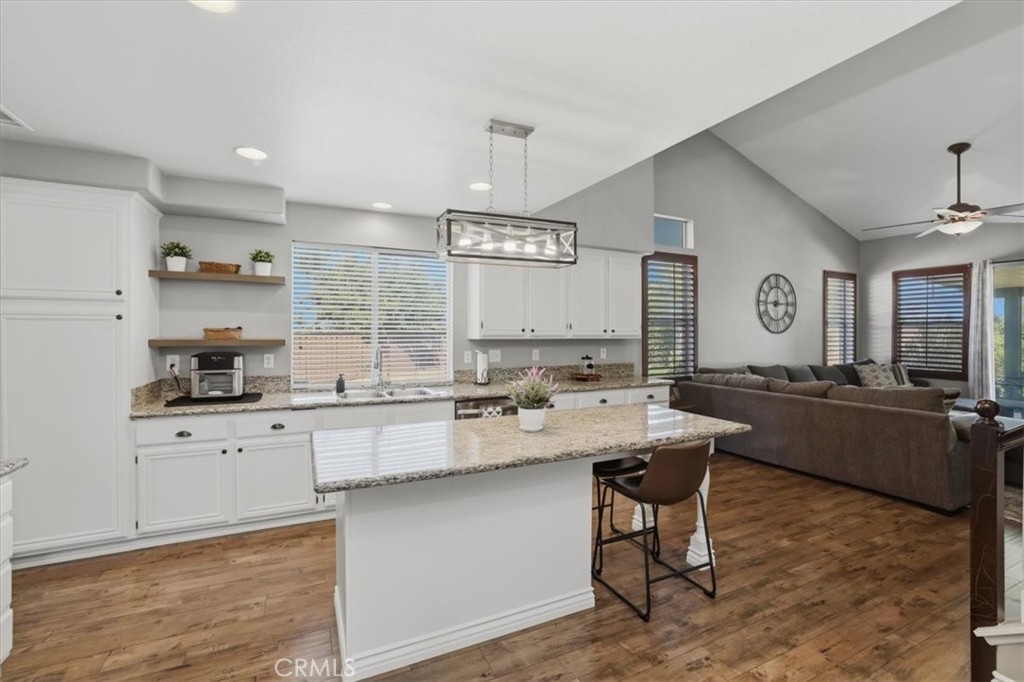 8509 Cabin Place Riverside, CA 92508 - Photo 19 of 67 Laminate flooring is easy to clean and avoids noticeable traffic areas.