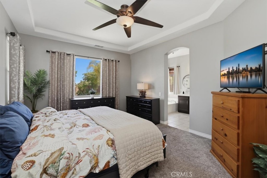 8509 Cabin Place Riverside, CA 92508 - Photo 21 of 67 Elegant touches withe the trey ceiling and arched doorway.