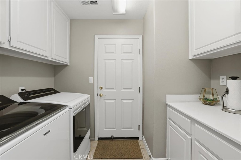 8509 Cabin Place Riverside, CA 92508 - Photo 26 of 67 Laundry room located on the first level by the garage entrance. It is easily concealed by the modern barn door in the hallway.