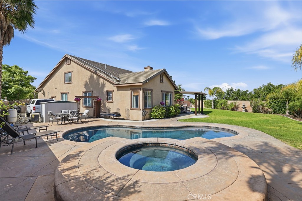 8509 Cabin Place Riverside, CA 92508 - Photo 37 of 67 Beautiful pool and spa ready for a fun summer. New pool heater and other pool equipment less than 5 years old adding great value for you.