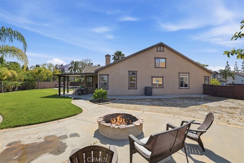 8509 Cabin Place Riverside, CA 92508 - Photo 41 of 67 Firepit and previous area with playground equipment.