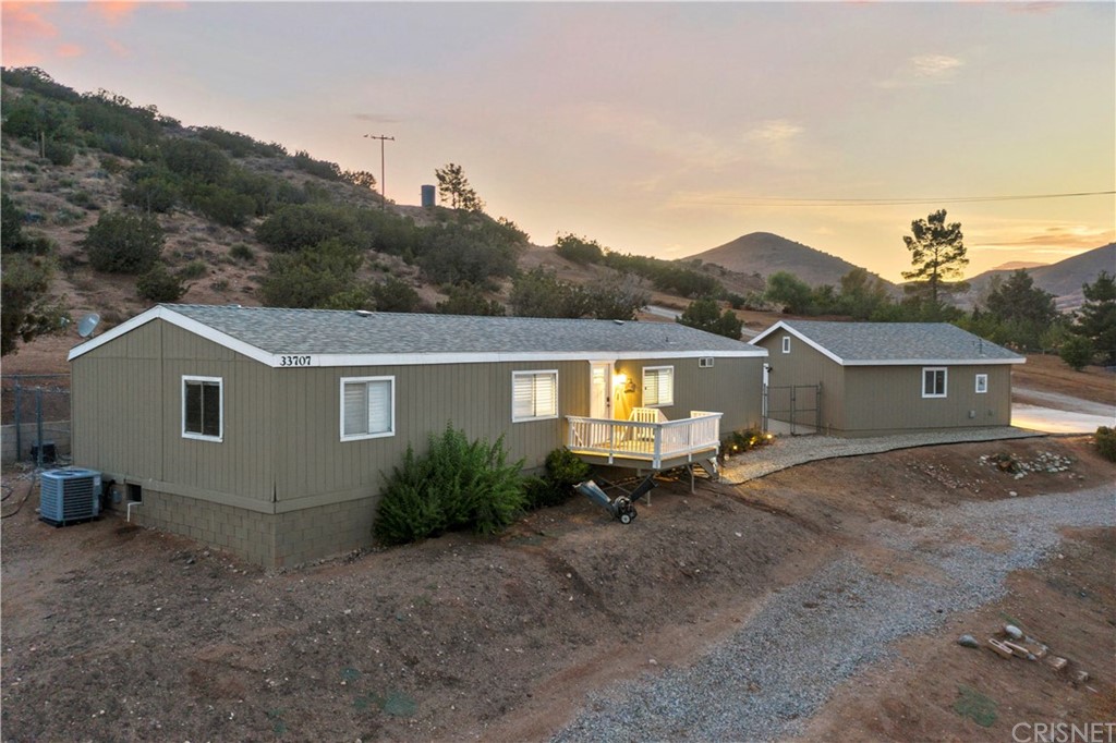 33707 Hubbard Road Acton, CA 93510 - Photo 1 of 1 a view of a house with a patio
