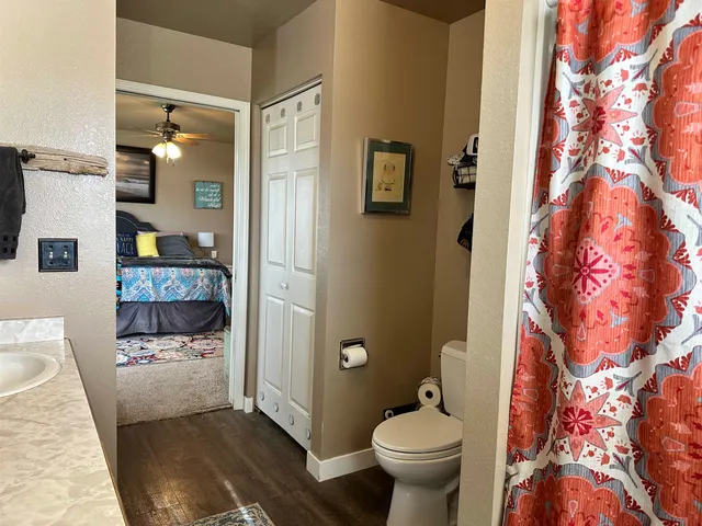 a bathroom with a sink and toilet