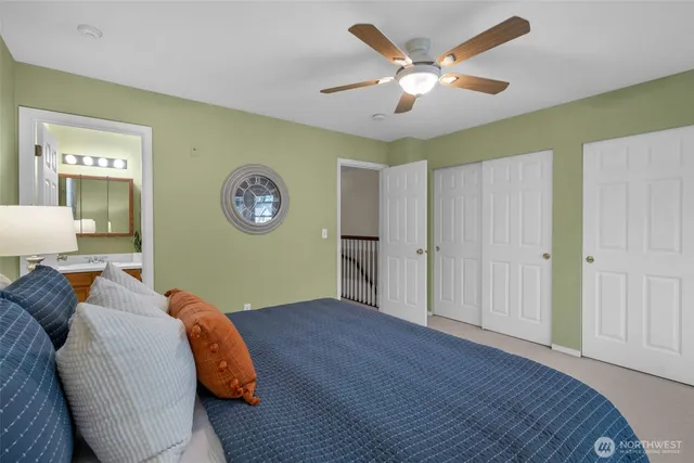 a bathroom with a sink mirror toilet and bathtub