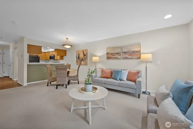 a living room with furniture and a table